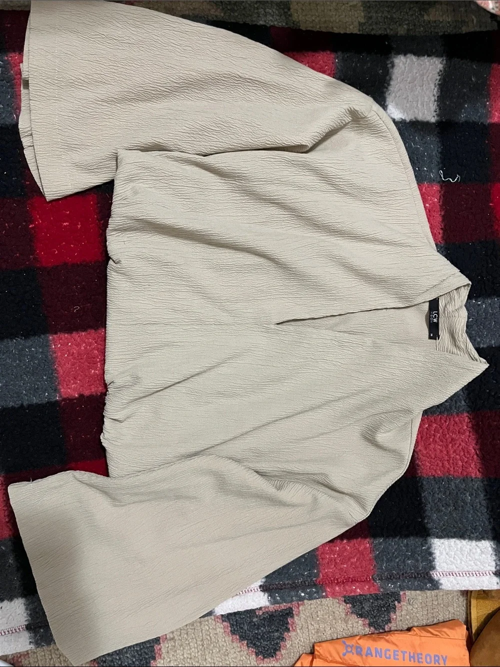 Cropped. Women's Cream V-Neck Textured Blouse